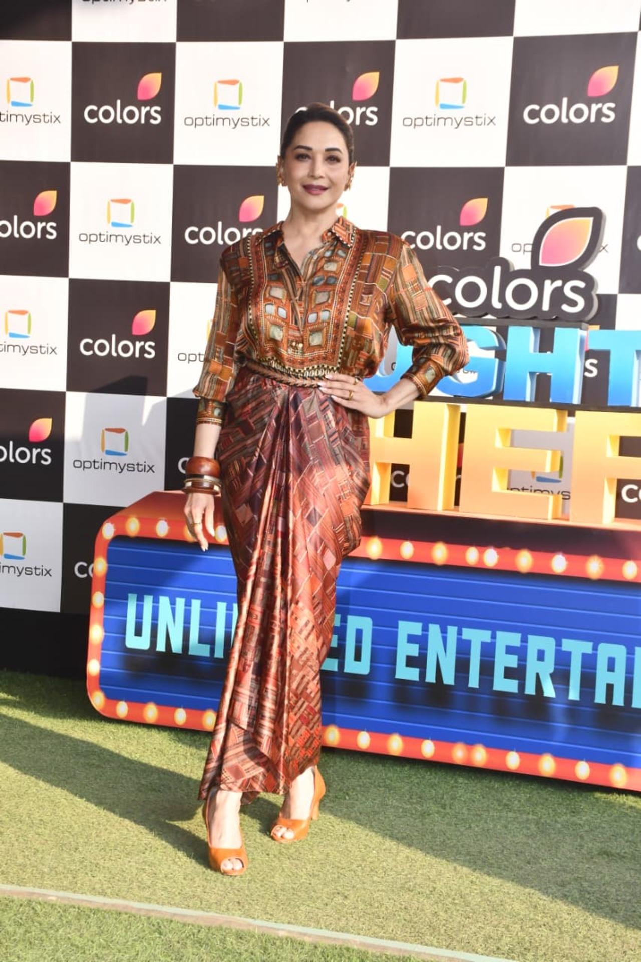 Madhuri Dixit was clicked on the sets of Pati Patni aur Panga to promote her upcoming series Mrs Deshpande. Contestants were seen donning her iconic looks to pay an ode to her.